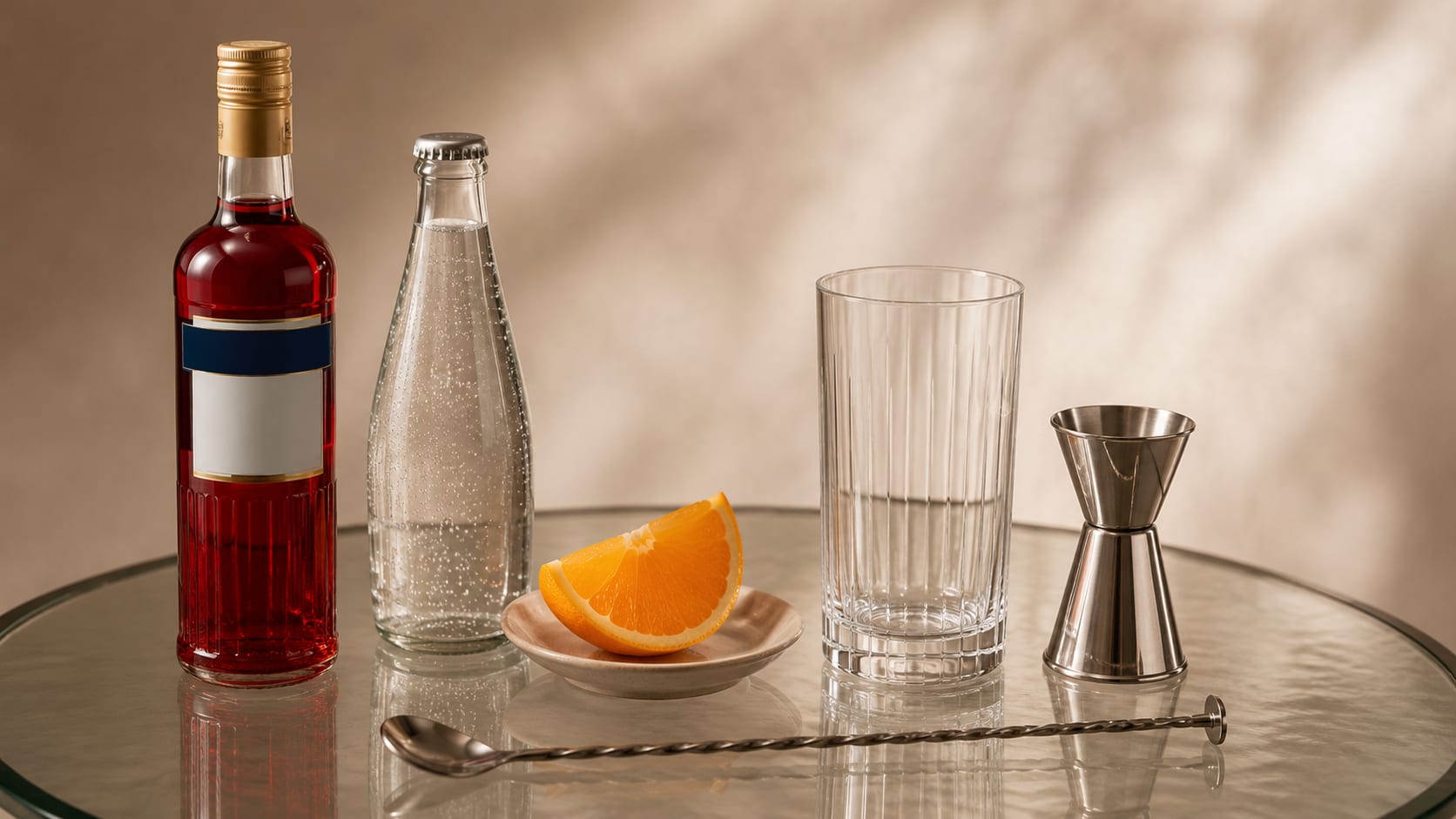 Ingredients and tools to make Campari Soda