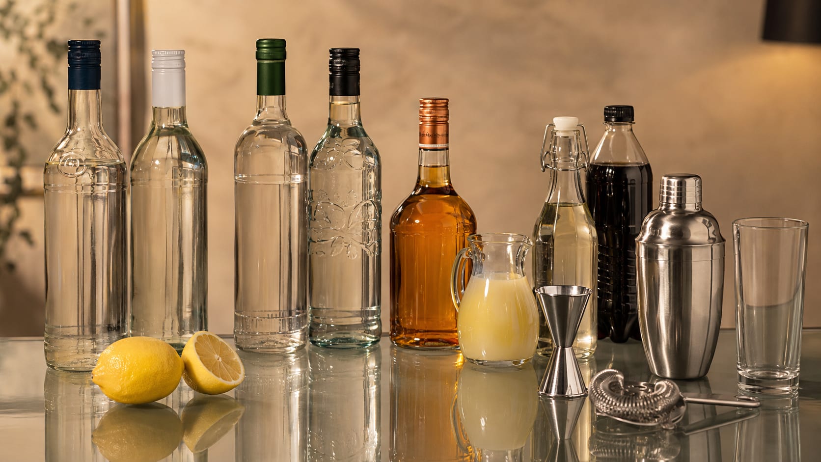 Ingredients and tools to make Long Island Iced Tea