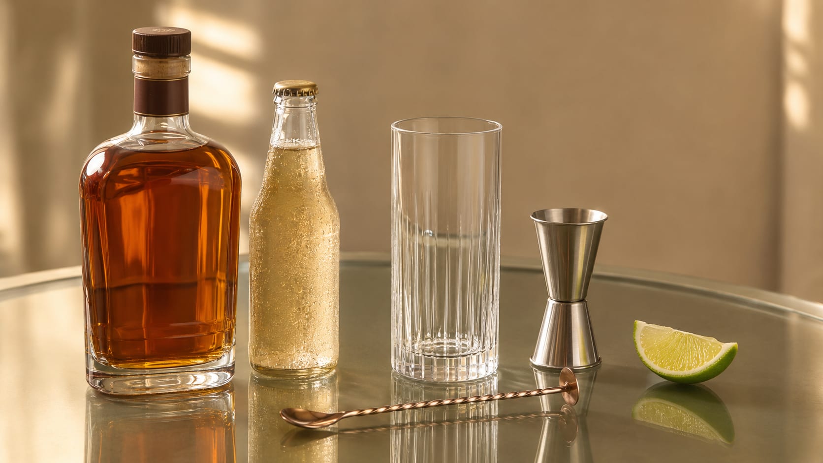 Ingredients and tools to make Whiskey Ginger